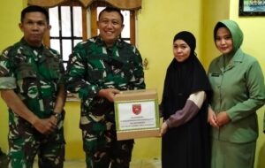 HUT Ke-67 Kodam VI/Mulawarman, Kodim 1001/HSU-BLG Serahkan Santunan bagi Warakawuri