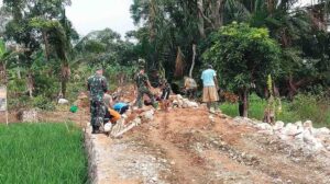 Progres 90 Persen, Satgas TMMD ke-127 Rampungkan Pembangunan Siring Jalan Usaha Tani di Hambuku Hulu